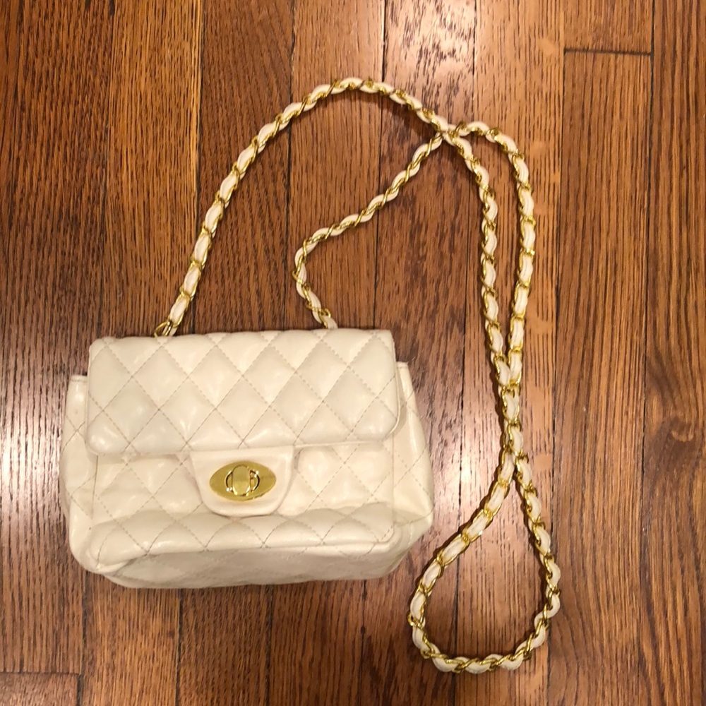 White leather crossbody purse with gold details
